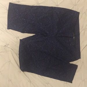 Navy blue pants with black design. (US 6)